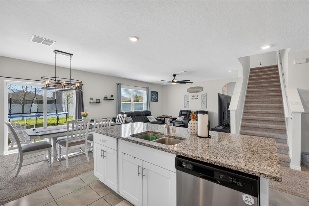 1809 Myrtlebrooke Drive Edgewater, FL 32141 - Photo 14 of 58 a kitchen with counter top space cabinets and appliances