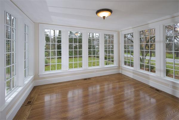 36 Whiting Road Wellesley, MA 02481 - Photo 2 of 8 a view of an empty room with a window and wooden floor