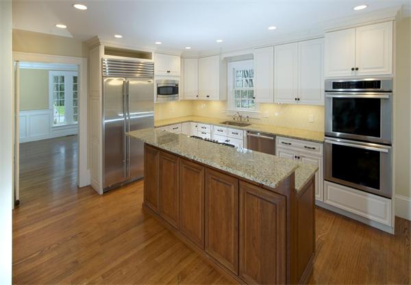 36 Whiting Road Wellesley, MA 02481 - Photo 6 of 8 a kitchen with stainless steel appliances granite countertop a stove a refrigerator and a sink