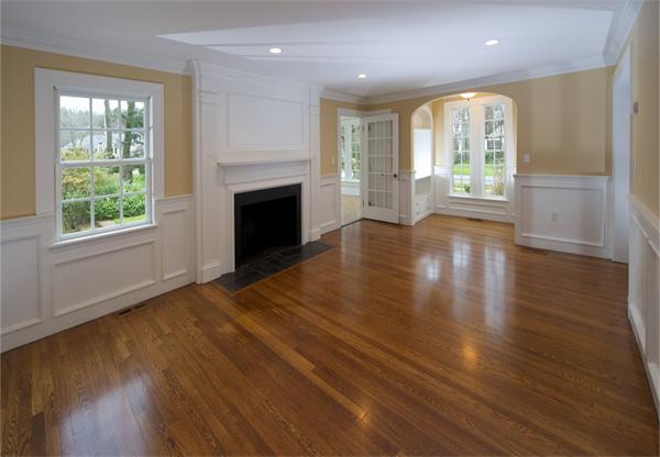 36 Whiting Road Wellesley, MA 02481 - Photo 7 of 8 an empty room with wooden floor and a fireplace