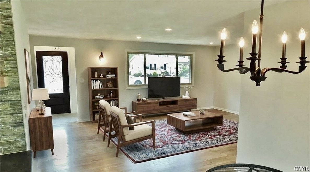 7742 Davis Road Clay, NY 13212 - Photo 9 of 45 Virtually staged - flow from living to dining area.