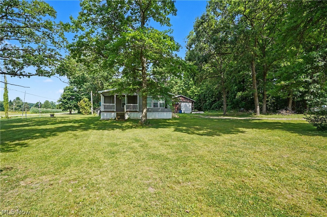 3424 Painesville Warren State Road Southington, OH 44470 - Photo 9 of 50 3424 Painesville Warren Rd, Southington, OH 44470 – Enjoy comfortable one-floor living in this well-maintained home built in 2018. Featuring 3 bedrooms, 2 full bathrooms, and an open-concept layout, this home offers both functionality and convenience. The spacious kitchen, dining, and living areas provide plenty of room for everyday living and entertaining. A large garage offers ample space for vehicles, storage, hobbies, or workshop needs. Situated on a generous lot with a welcoming front porch, this property combines modern living with a peaceful country setting. Move-in ready and waiting for its next owner!