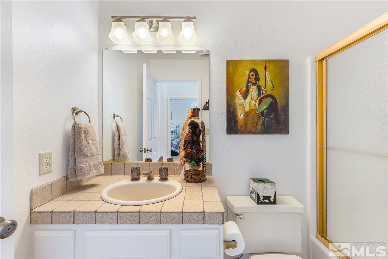 755a Bigler Circle, Unit B Stateline, NV 89449 - Photo 19 of 23 a bathroom with a sink and a mirror