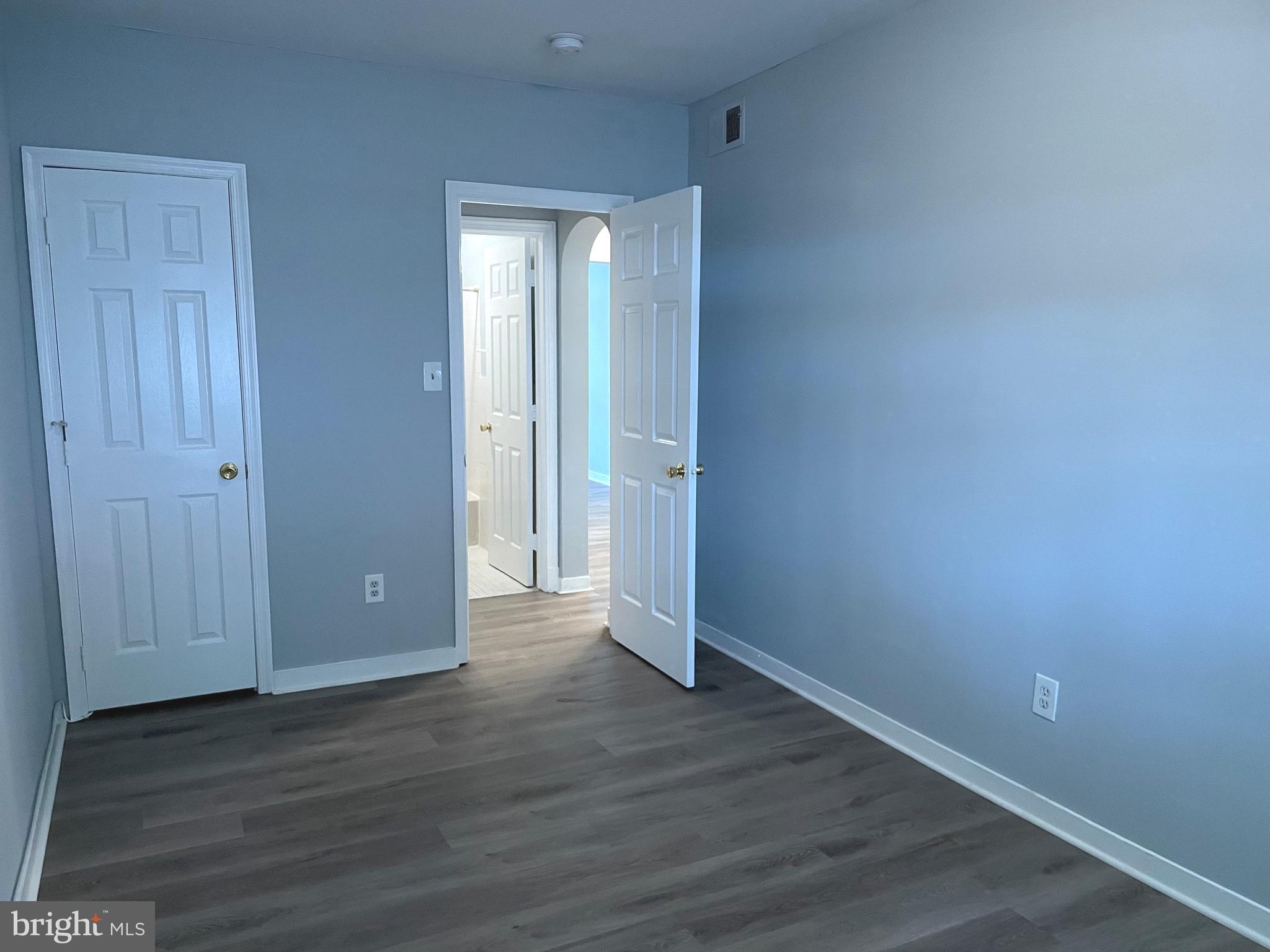 600 I Street Northeast, Unit 2 Washington, DC 20002 - Photo 7 of 19 a view of an empty room with wooden floor