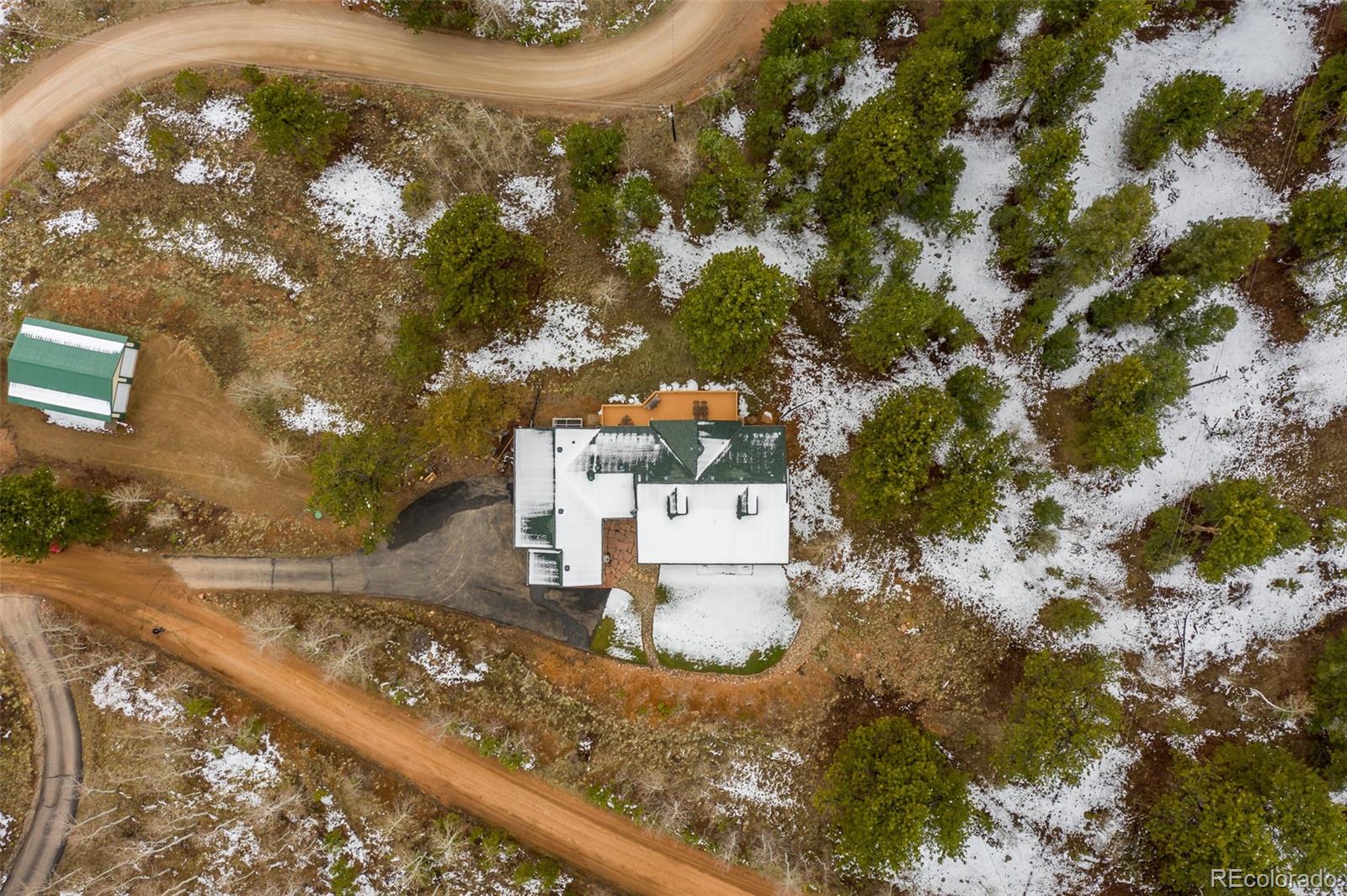 35681 Upper Aspen Lane Pine, CO 80470 - Photo 31 of 36 a view of a house with a yard