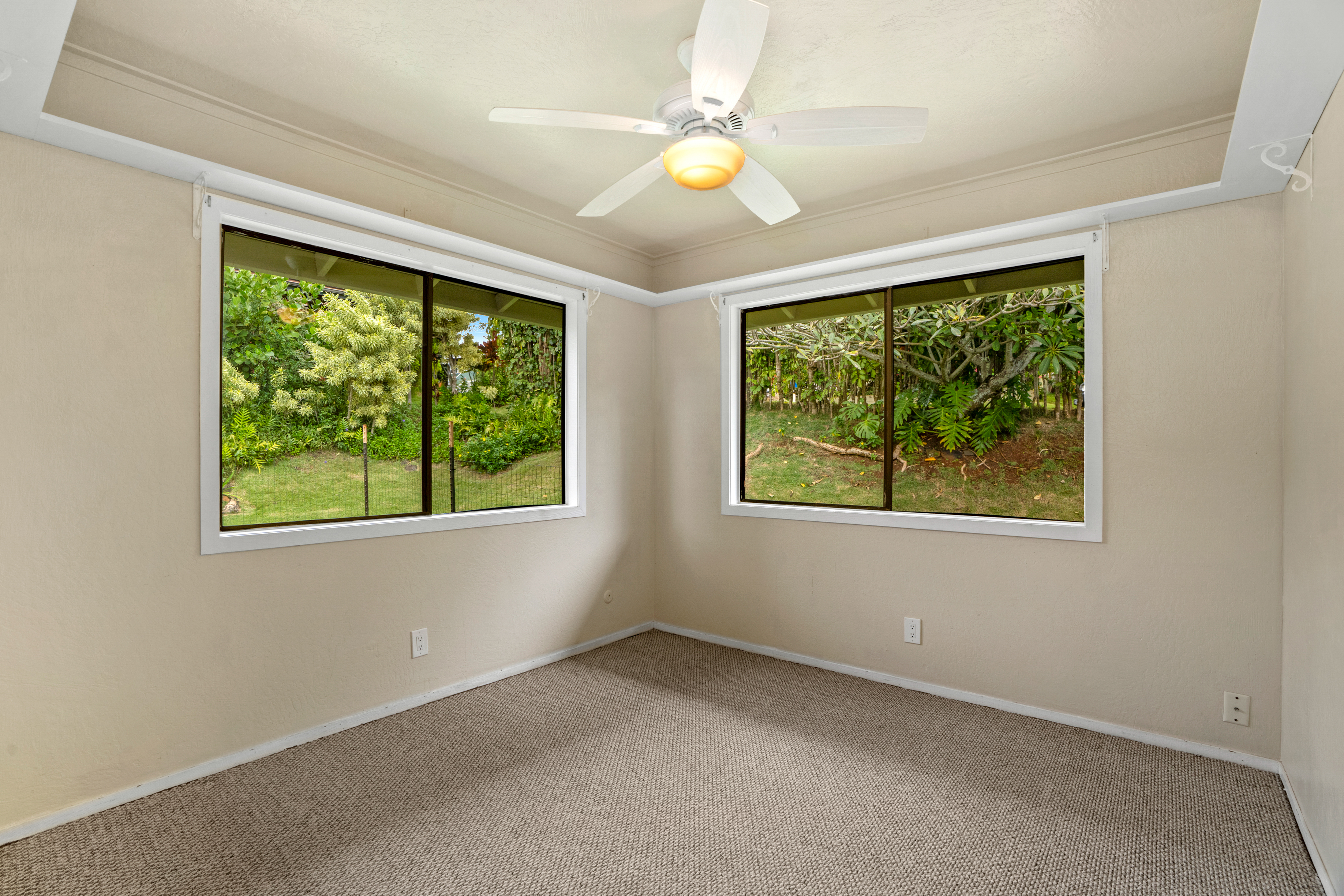 3587 Kaloke Street Kalaheo, HI 96741 - Photo 18 of 30 an empty room with windows and view