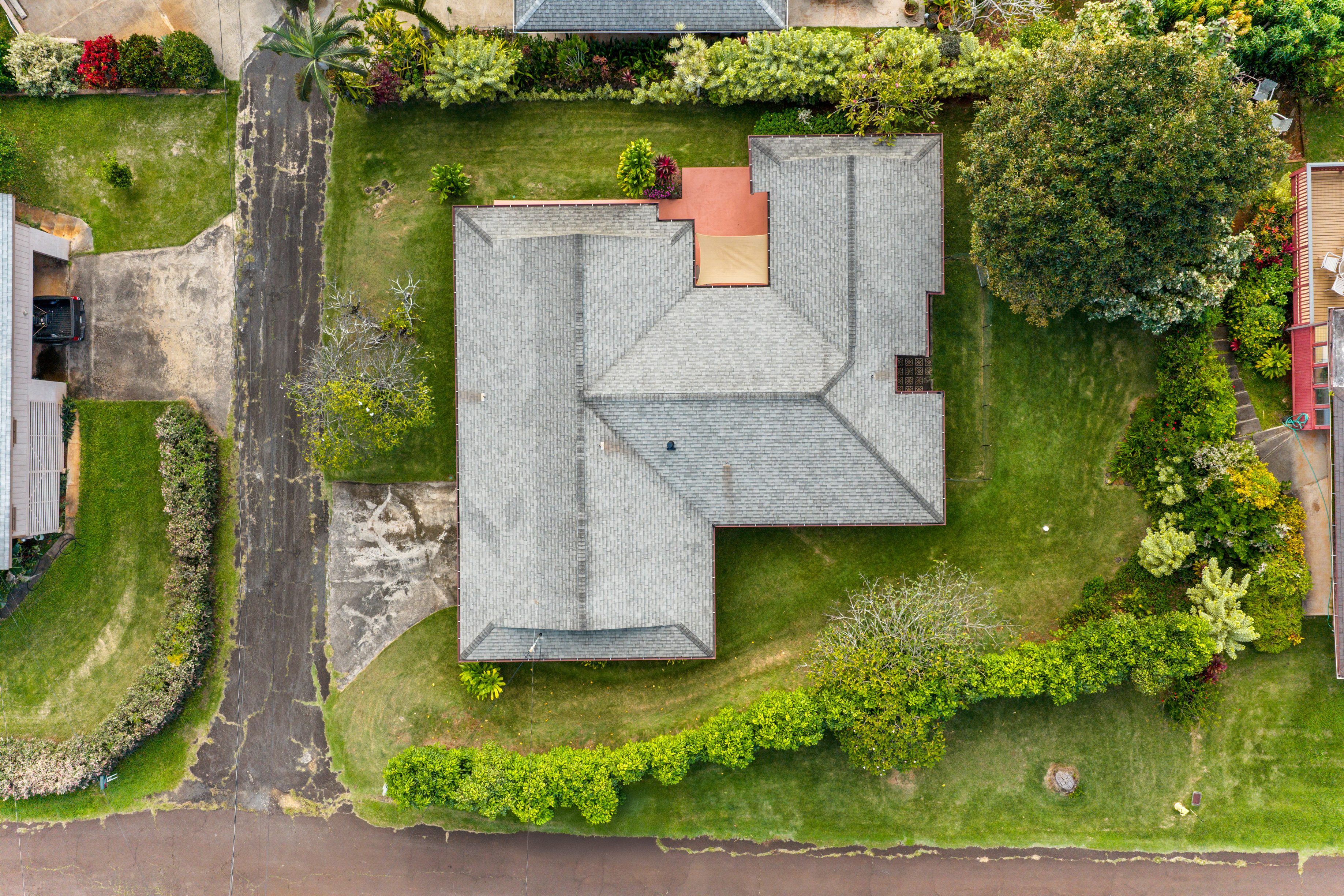 3587 Kaloke Street Kalaheo, HI 96741 - Photo 29 of 30 an aerial view of a house with a yard basket ball court and outdoor seating