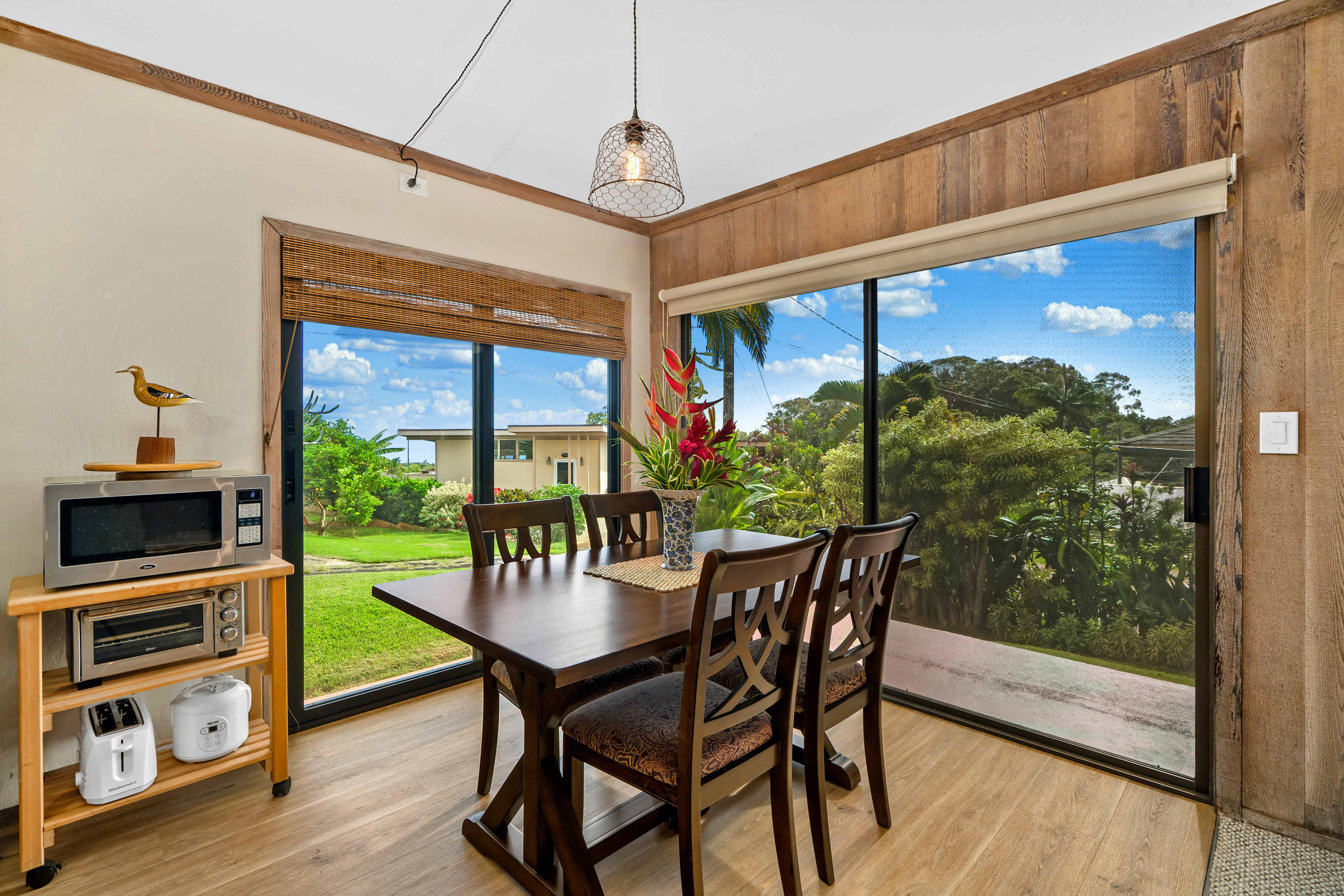 3587 Kaloke Street Kalaheo, HI 96741 - Photo 8 of 30 a view of a dining room with furniture window and outside view