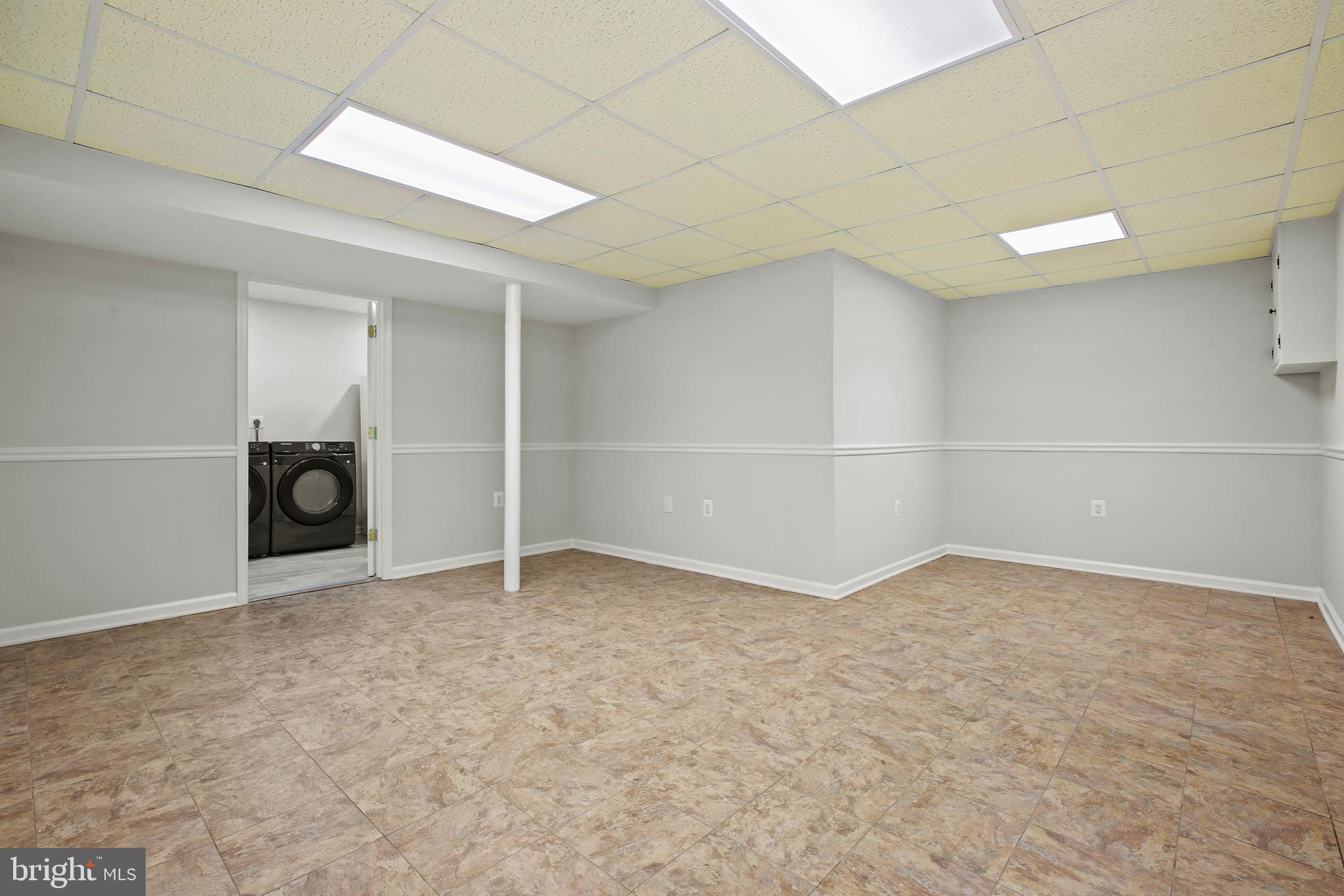 1445 Northgate Road Northwest Washington, DC 20012 - Photo 19 of 20 an empty room with closet and natural light