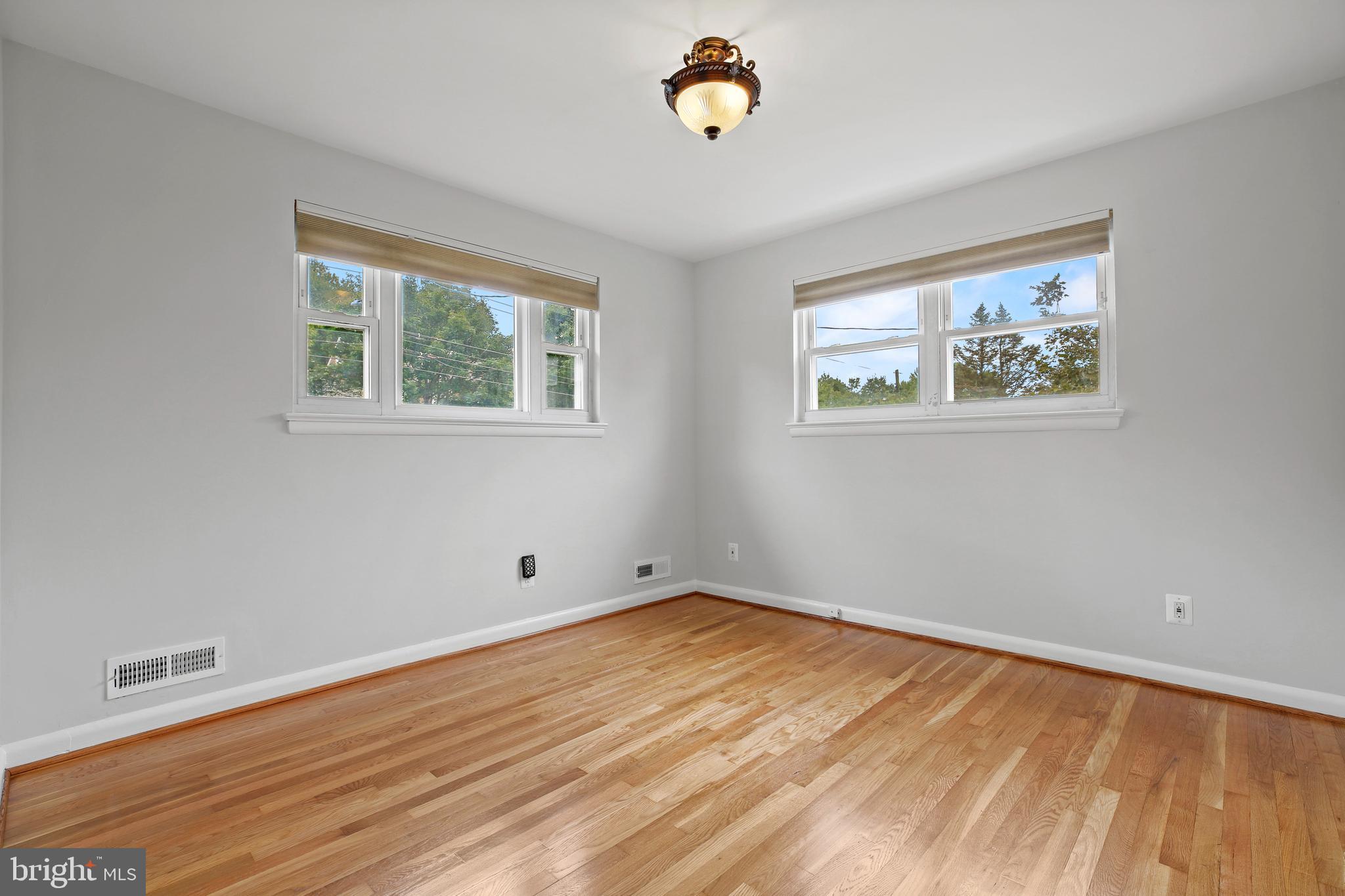 1445 Northgate Road Northwest Washington, DC 20012 - Photo 10 of 20 a view of empty room with wooden floor