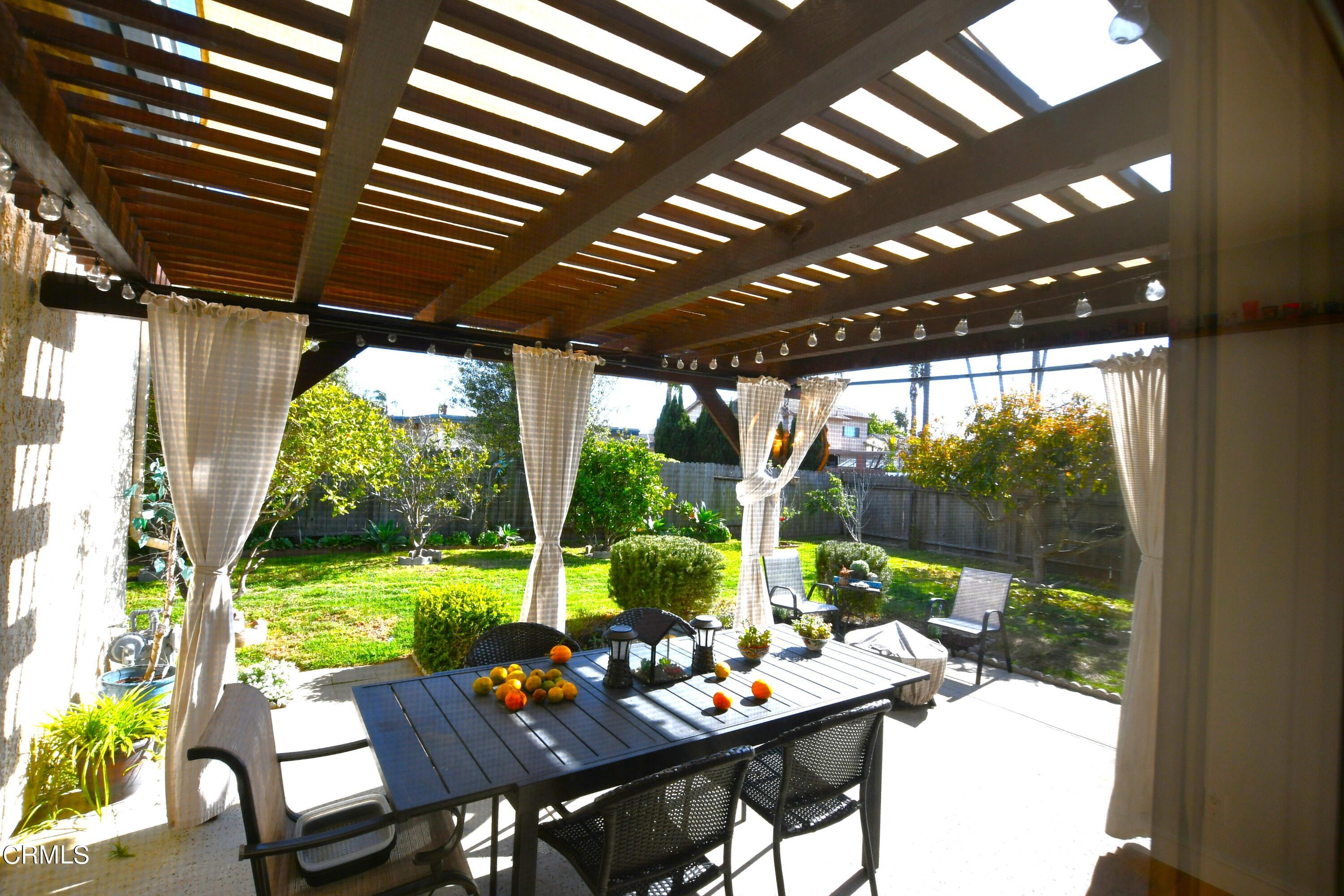 1711 Masthead Drive Oxnard, CA 93035 - Photo 14 of 18 a view of a patio with a big yard