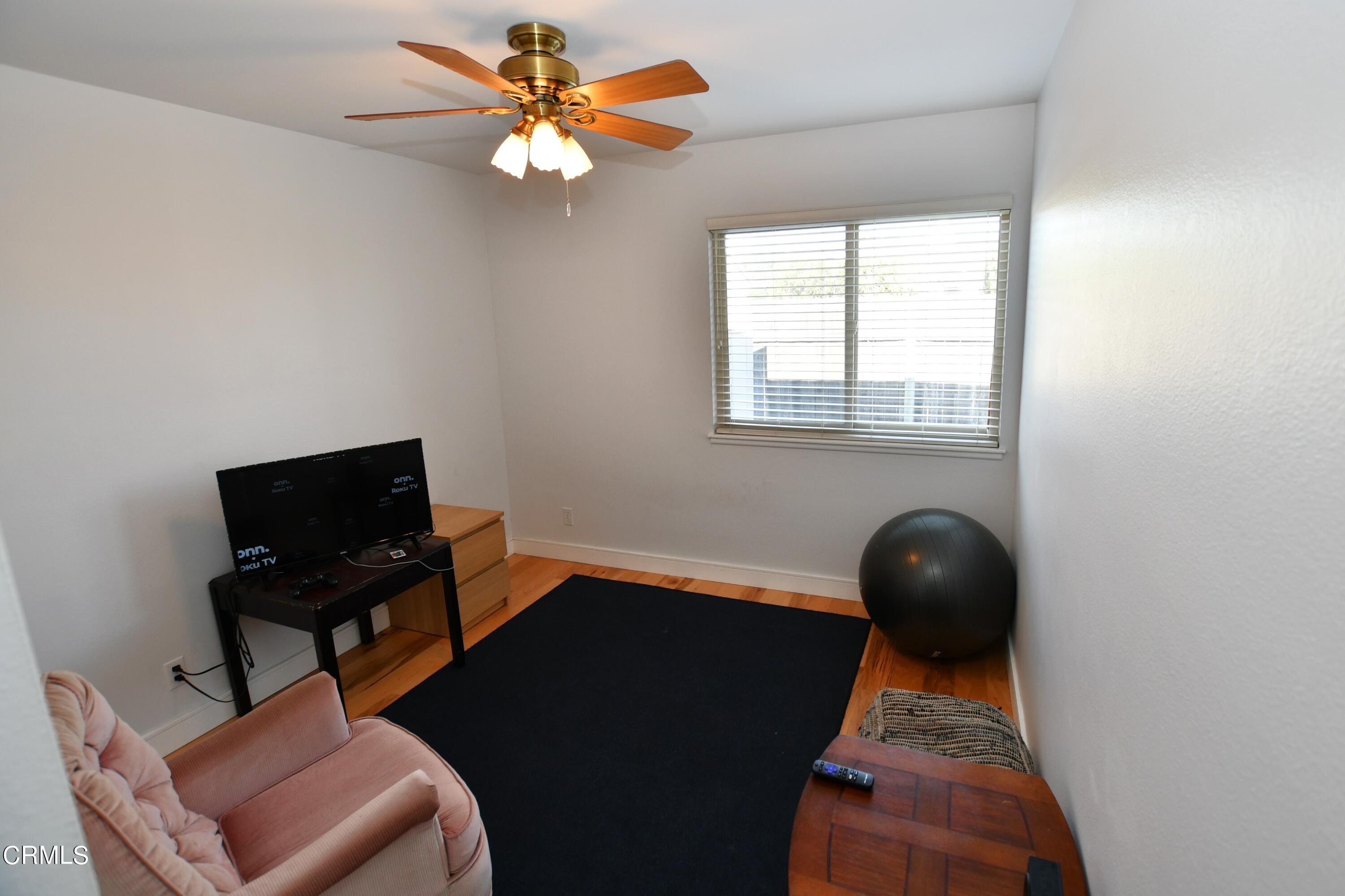 1711 Masthead Drive Oxnard, CA 93035 - Photo 8 of 18 a living room with furniture and a window