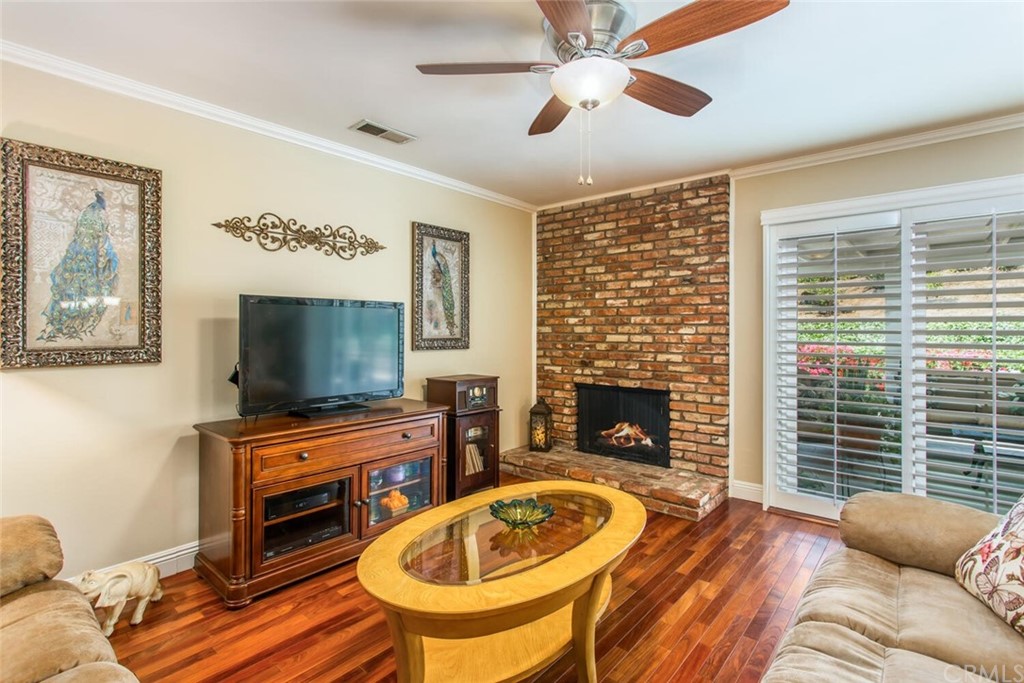 602 Juniper Court Redlands, CA 92374 - Photo 18 of 38 a living room with furniture and a flat screen tv