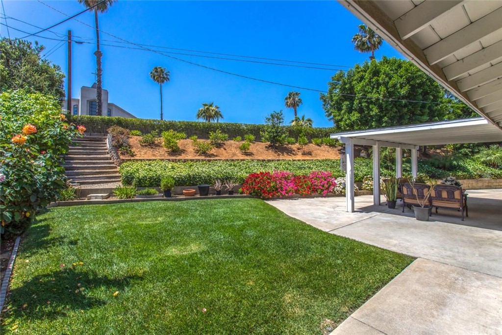 602 Juniper Court Redlands, CA 92374 - Photo 33 of 38 a view of a backyard with plants and a patio