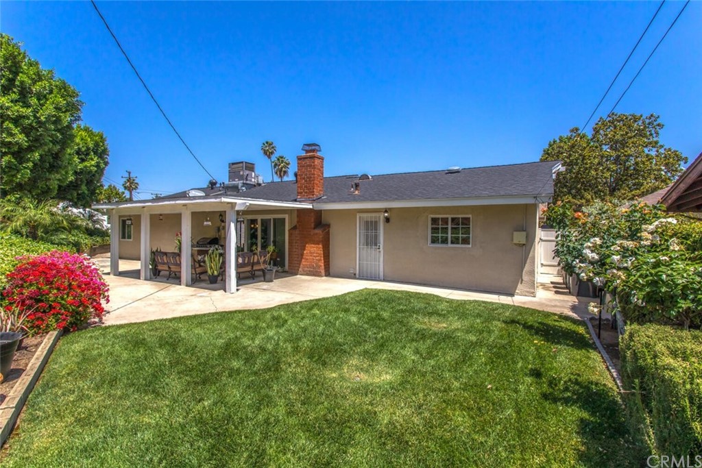 602 Juniper Court Redlands, CA 92374 - Photo 35 of 38 a front view of a house with a yard and porch
