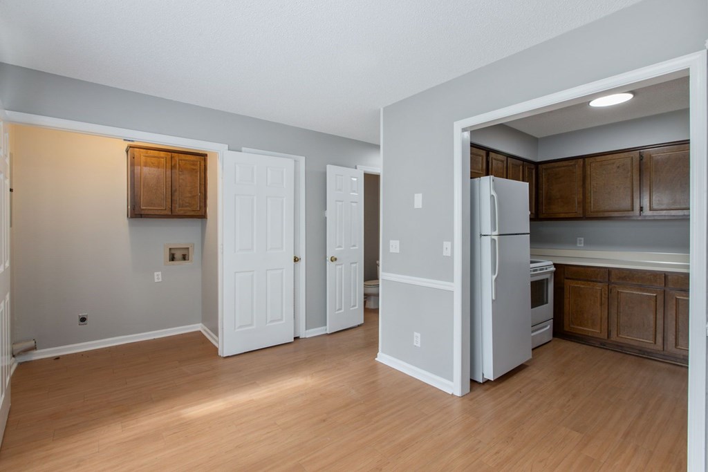 3660 Maryland Circle, Unit C Columbus, GA 31907 - Photo 14 of 21 a kitchen with stainless steel appliances a refrigerator and a stove top oven