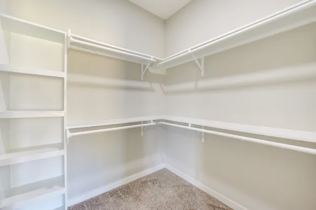 a view of an empty walk in closet