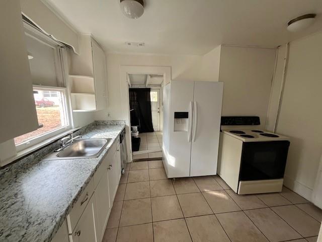 1119 Canton Road Marietta, GA 30066 - Photo 3 of 10 a kitchen with granite countertop a refrigerator and a stove