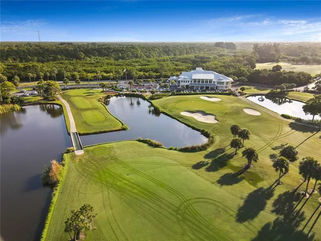 a view of a swimming pool with seating area