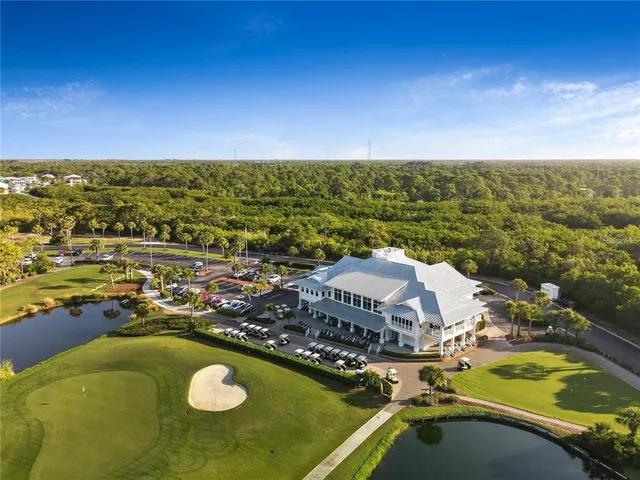 a view of a swimming pool with an ocean view