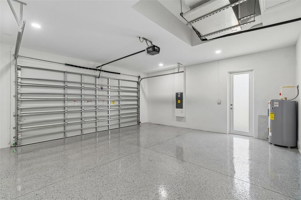 6018 Newmark Street Spring Hill, FL 34606 - Photo 17 of 26 a view of a garage