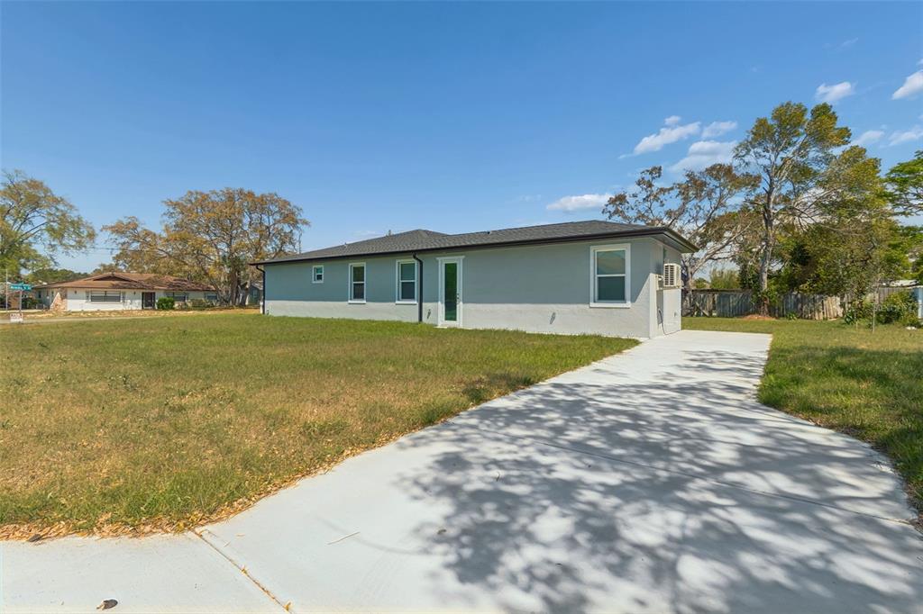 6018 Newmark Street Spring Hill, FL 34606 - Photo 20 of 26 a view of pool with outdoor space