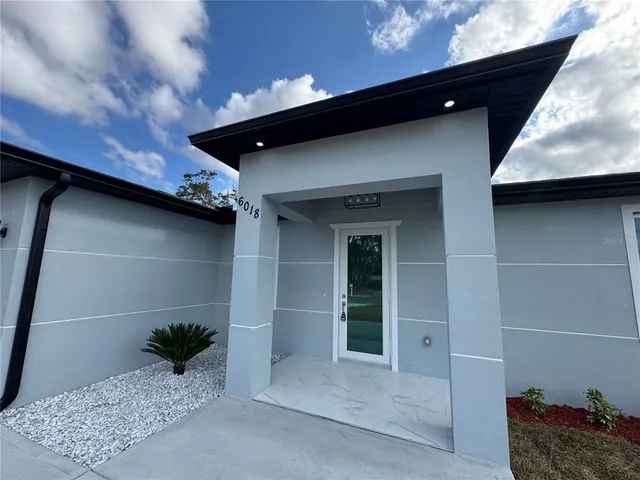 a house view with a outdoor space