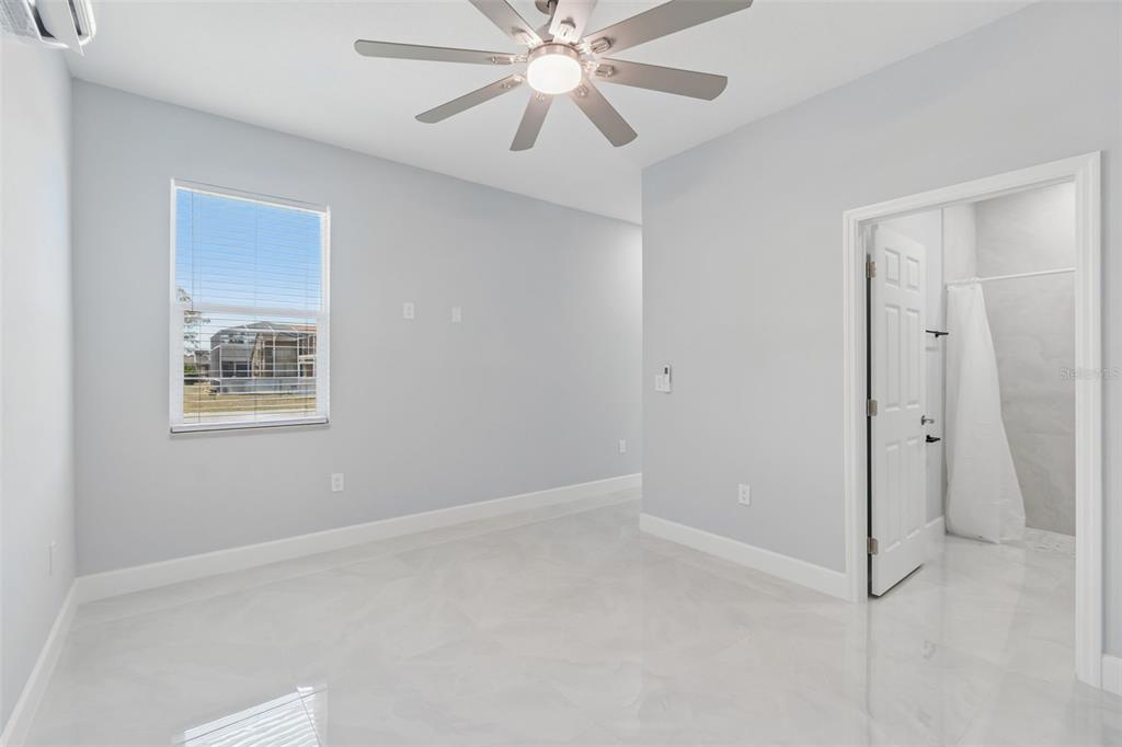 6018 Newmark Street Spring Hill, FL 34606 - Photo 24 of 26 a view of an empty room with a window