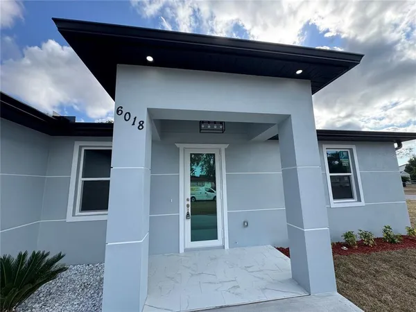 a view of kitchen and windows