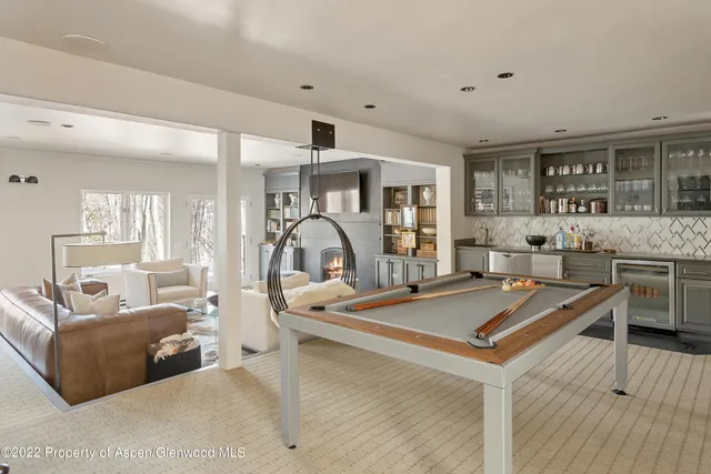 a kitchen with stainless steel appliances granite countertop a stove and a sink