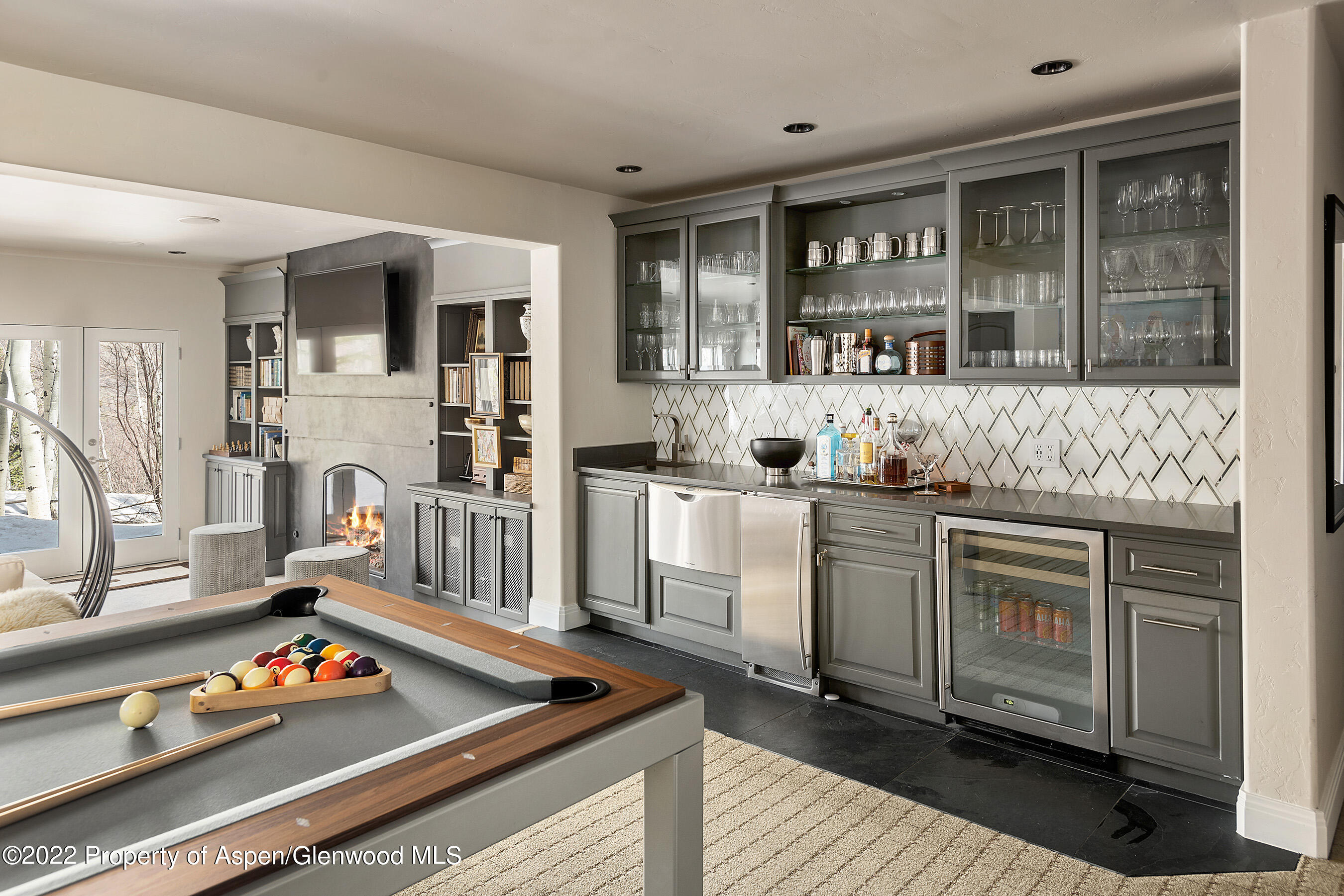 399 Maple Ridge Lane Snowmass Village, CO 81615 - Photo 16 of 27 a kitchen with stainless steel appliances granite countertop a stove and a sink