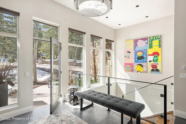 a bedroom with a bed and a fireplace