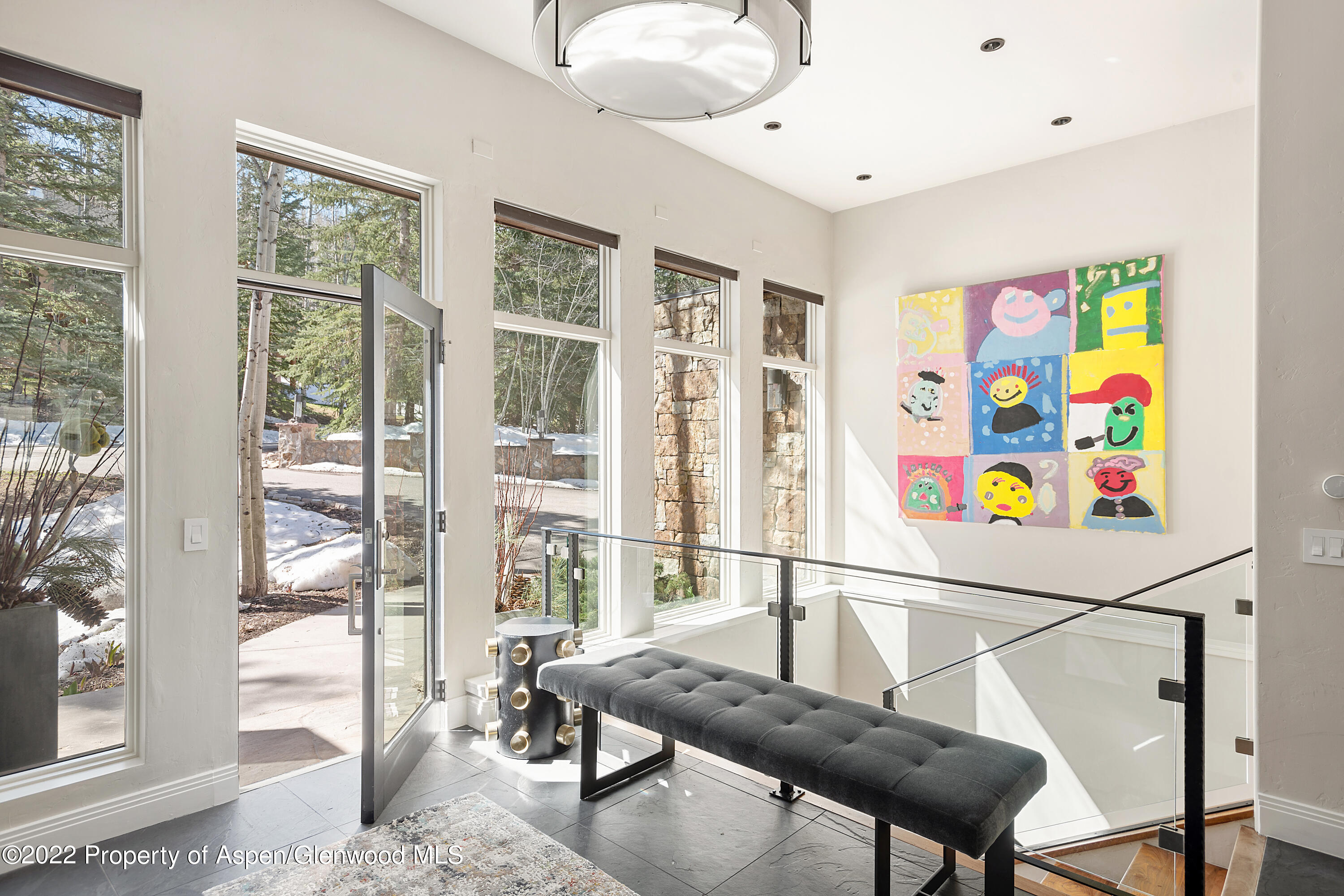 399 Maple Ridge Lane Snowmass Village, CO 81615 - Photo 9 of 27 a living room with furniture and a window