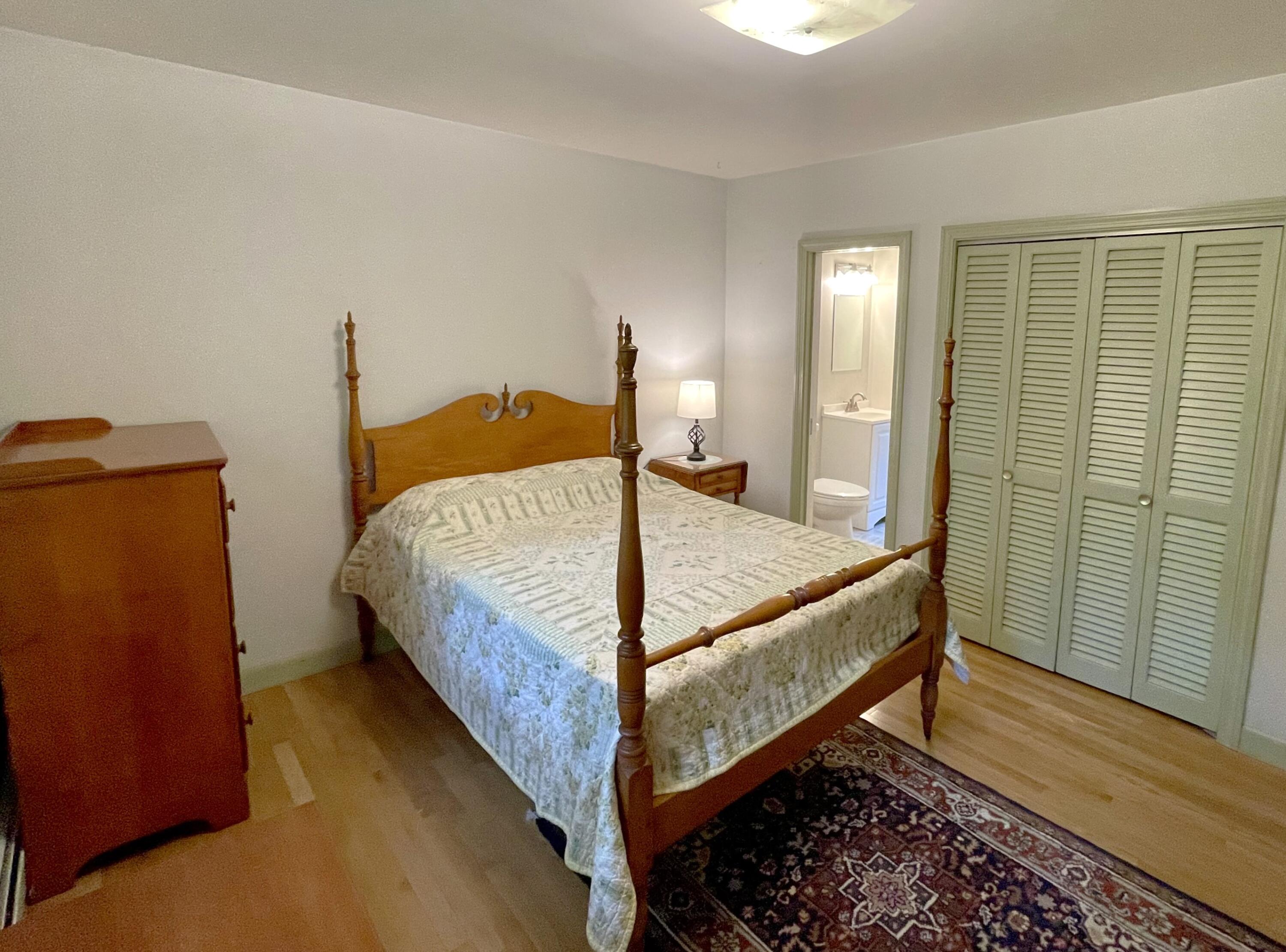 73 Tern Lane Centerville, MA 02632 - Photo 15 of 31 a bed sitting in a bedroom next to a window