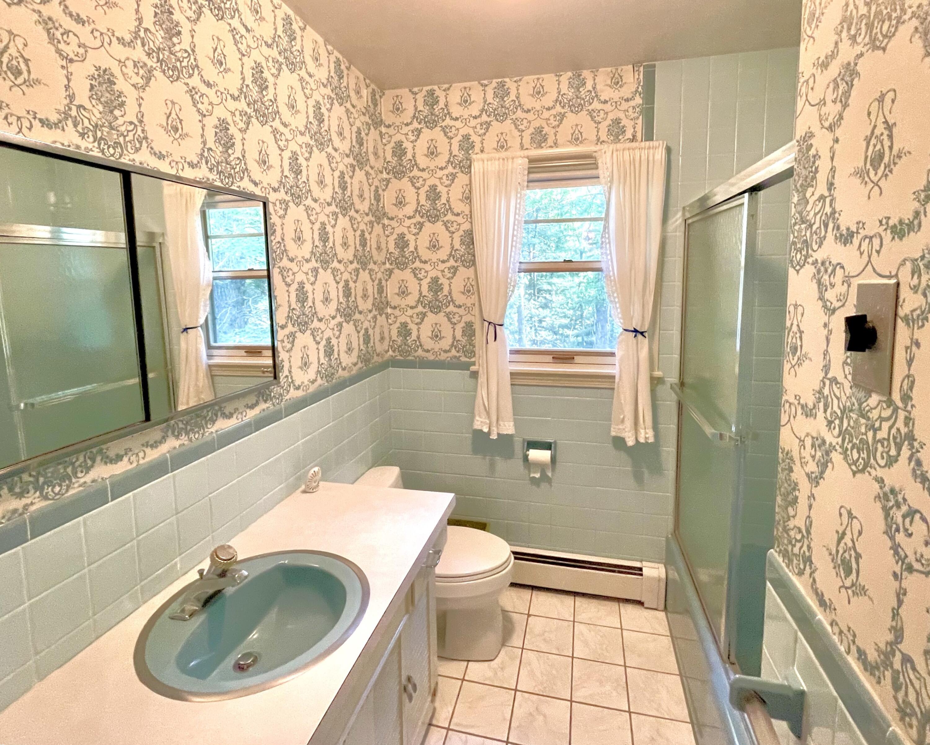 73 Tern Lane Centerville, MA 02632 - Photo 17 of 31 a bathroom with a sink a toilet and shower