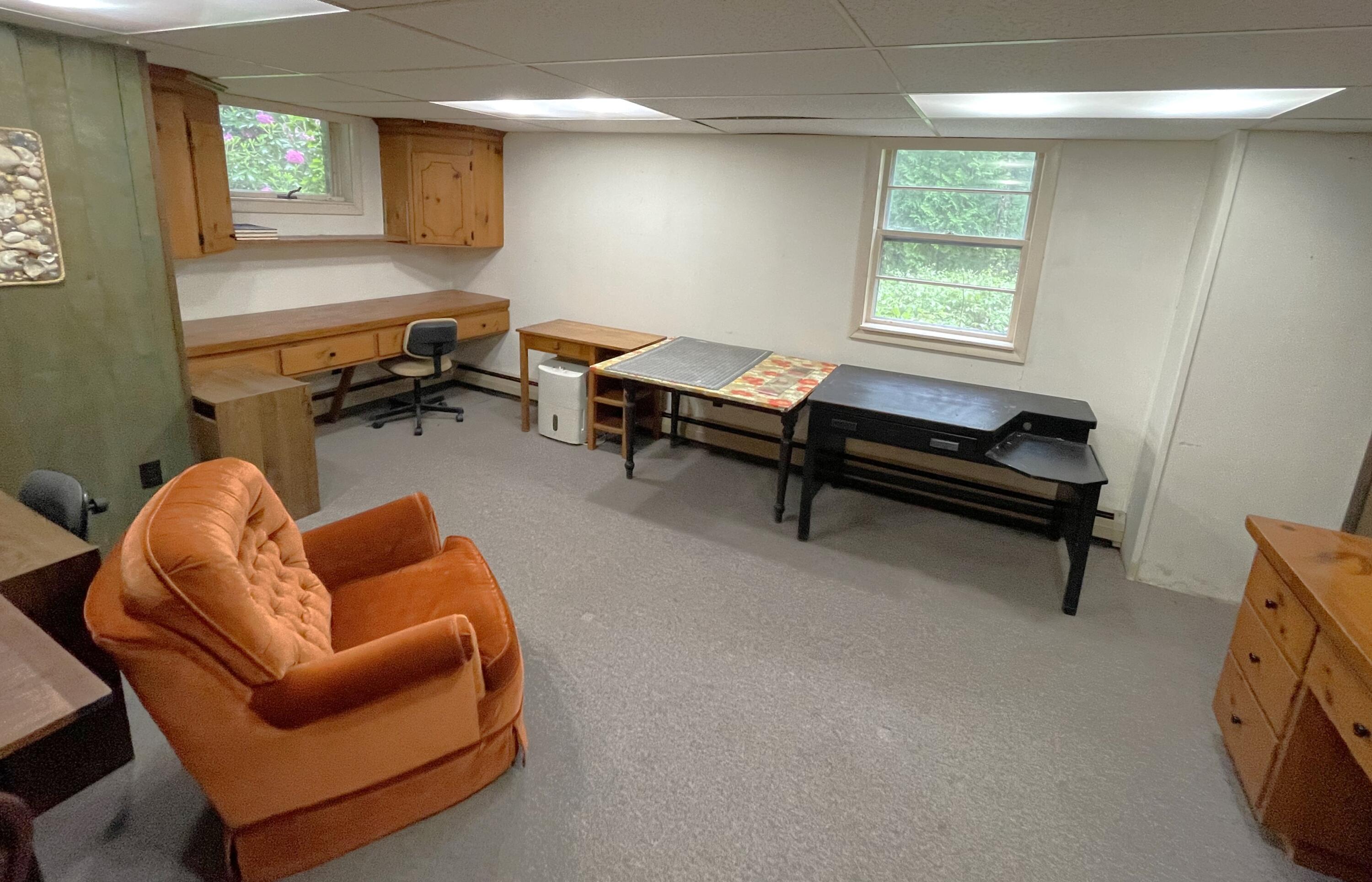 73 Tern Lane Centerville, MA 02632 - Photo 18 of 31 a living room with furniture a window and a wooden floor