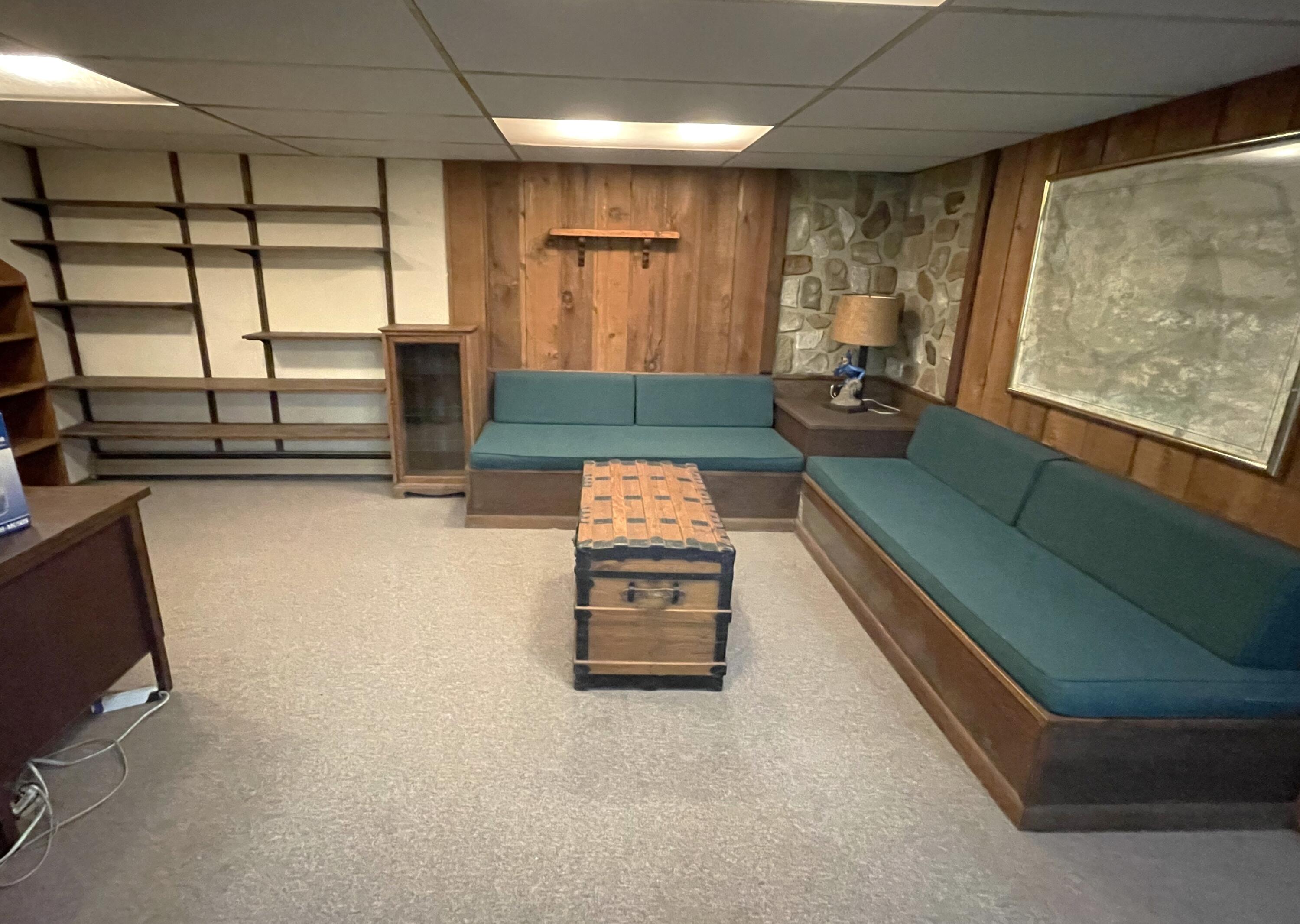 73 Tern Lane Centerville, MA 02632 - Photo 20 of 31 a living room with furniture and a flat screen tv