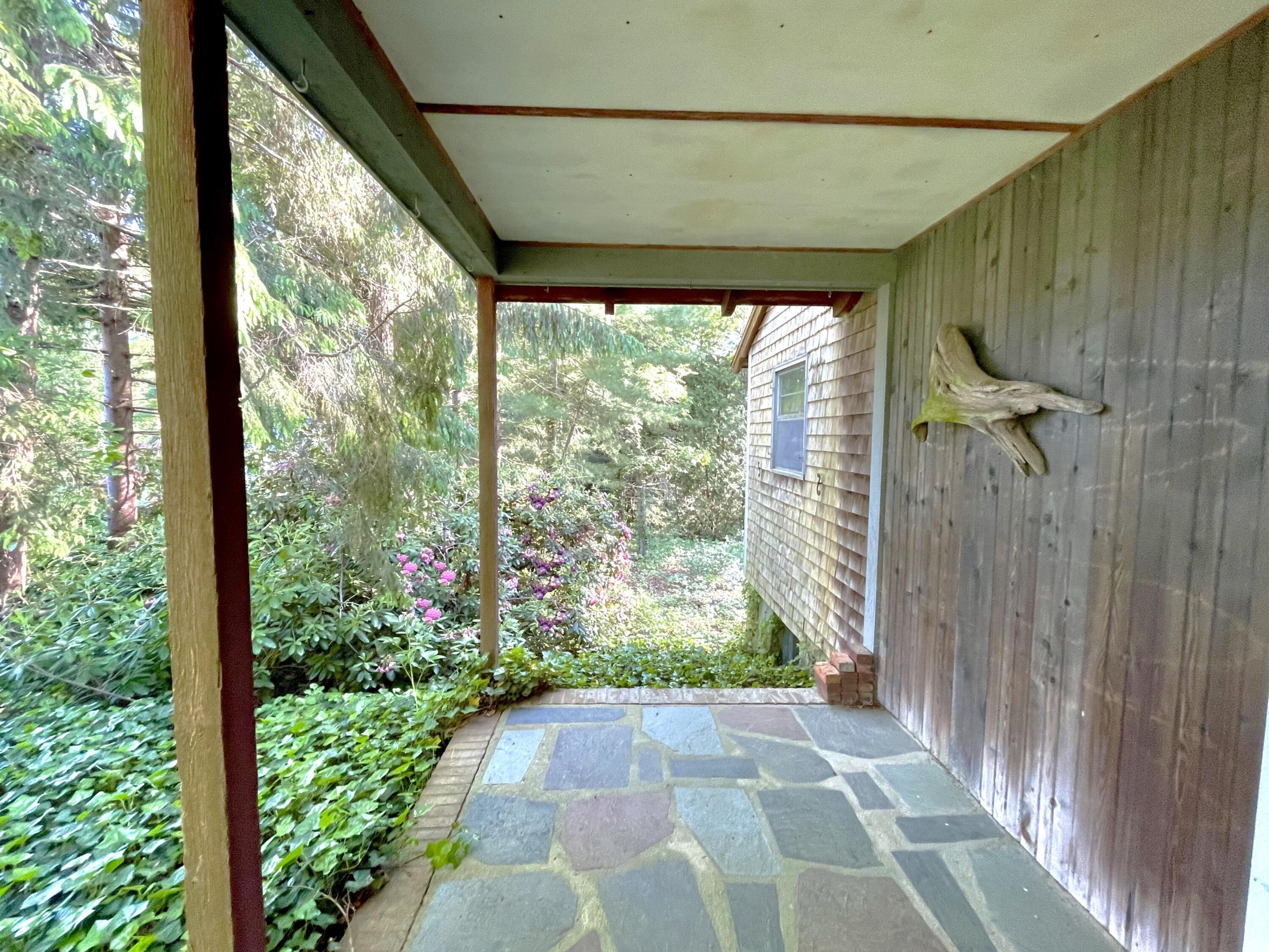 73 Tern Lane Centerville, MA 02632 - Photo 23 of 31 a view of a garden from a windows