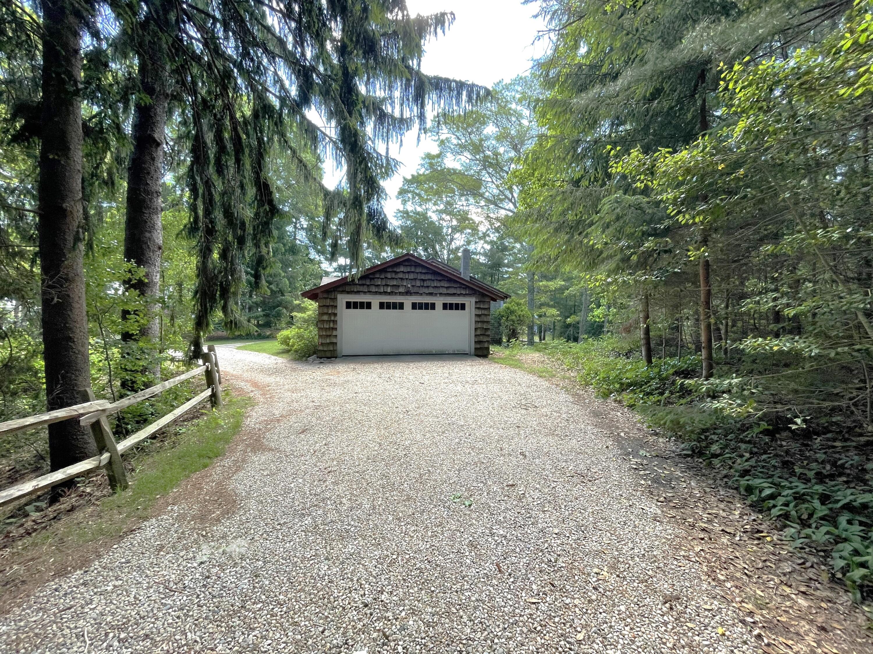 73 Tern Lane Centerville, MA 02632 - Photo 25 of 31 a view of a yard with large trees