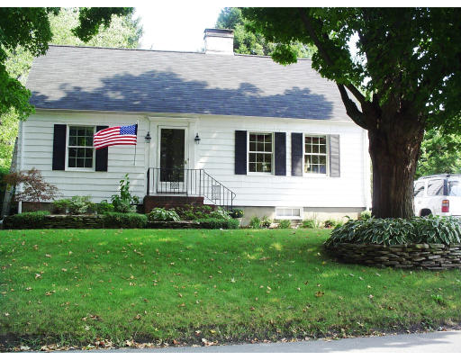 85 Gleason Road Lexington, MA 02420 - Photo 1 of 10 a front view of a house with a yard
