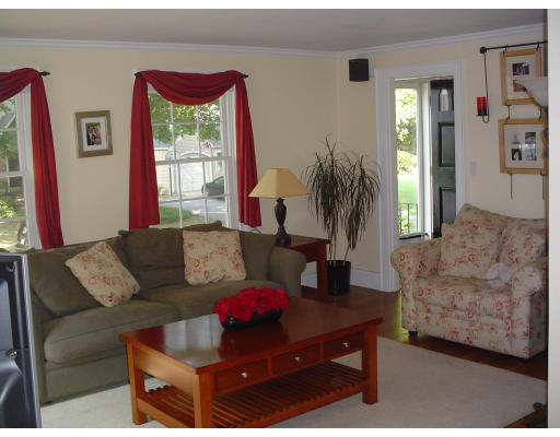 85 Gleason Road Lexington, MA 02420 - Photo 2 of 10 a living room with furniture and a large window