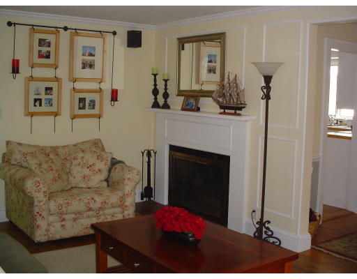 85 Gleason Road Lexington, MA 02420 - Photo 3 of 10 a living room with furniture and a fireplace