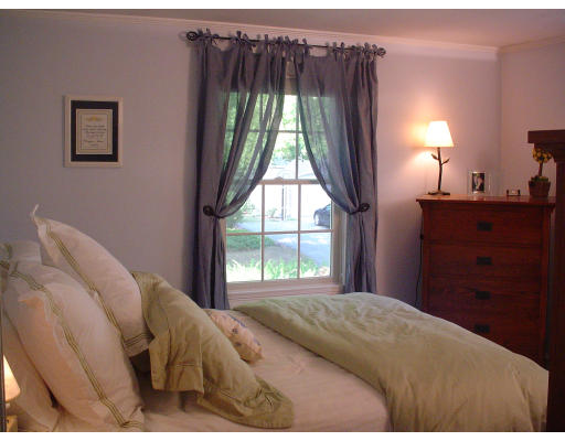 85 Gleason Road Lexington, MA 02420 - Photo 10 of 10 a bedroom with a bed and a window