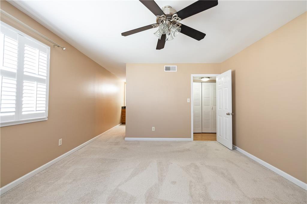 1468 Briarwood Road Northeast, Unit 1005 Atlanta, GA 30319 - Photo 25 of 45 a view of an empty room with a window