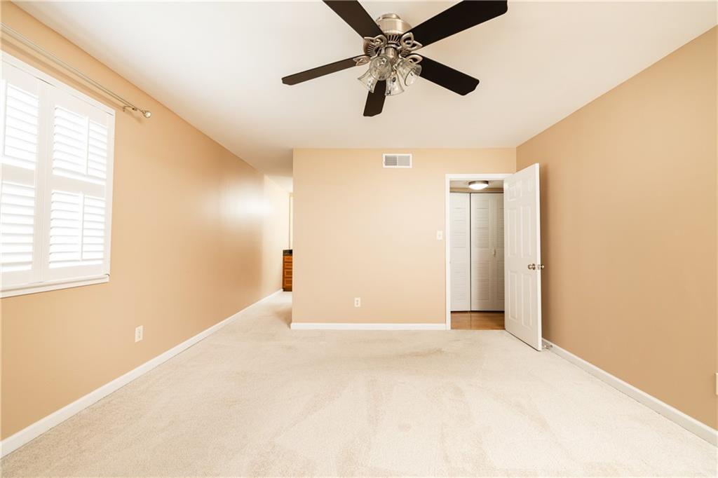 1468 Briarwood Road Northeast, Unit 1005 Atlanta, GA 30319 - Photo 27 of 45 a view of an empty room with a window