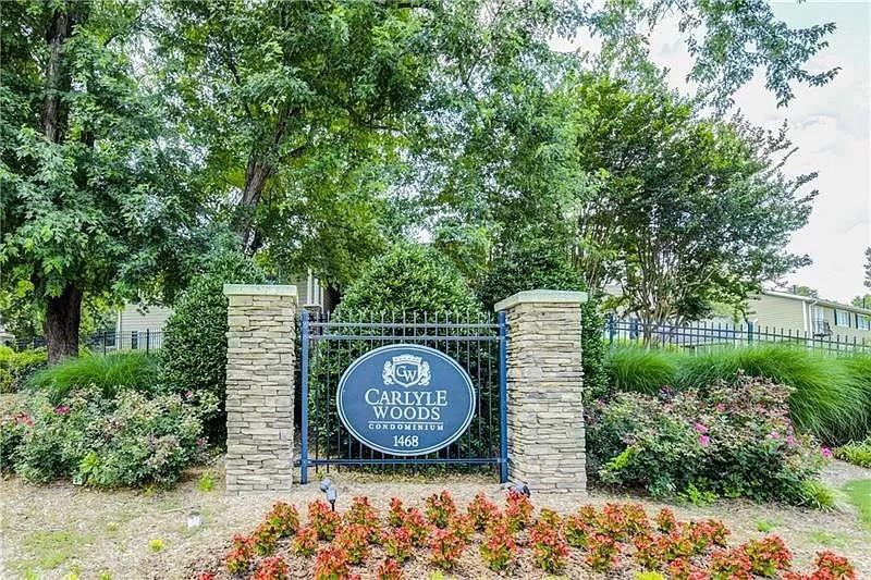 1468 Briarwood Road Northeast, Unit 1005 Atlanta, GA 30319 - Photo 3 of 45 a view of a park with a large trees