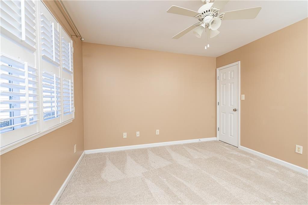 1468 Briarwood Road Northeast, Unit 1005 Atlanta, GA 30319 - Photo 31 of 45 a view of an empty room with a window