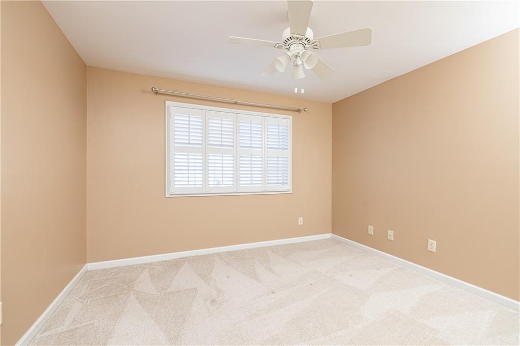 1468 Briarwood Road Northeast, Unit 1005 Atlanta, GA 30319 - Photo 34 of 45 an empty room with a window