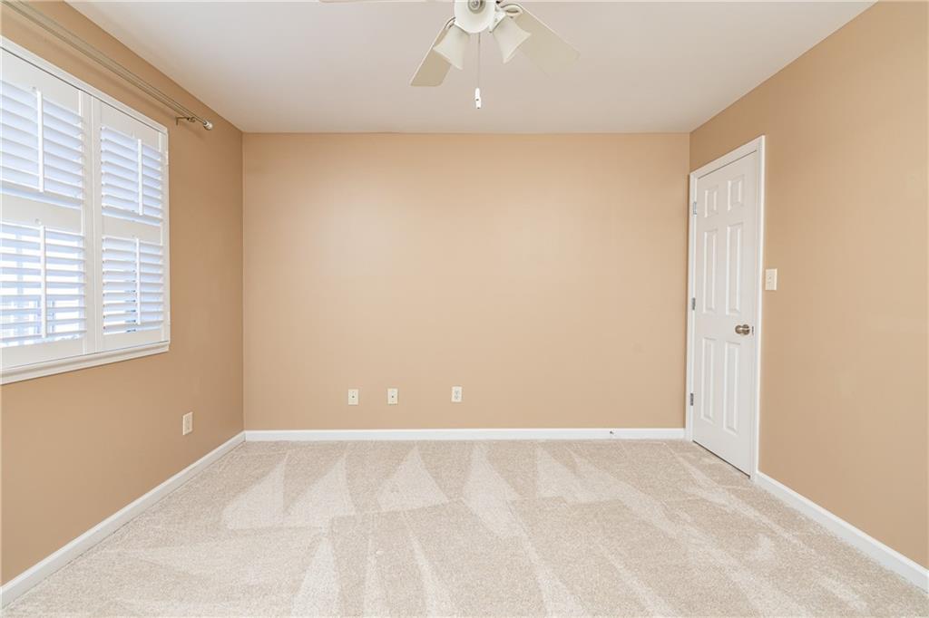 1468 Briarwood Road Northeast, Unit 1005 Atlanta, GA 30319 - Photo 35 of 45 a view of an empty room with a window