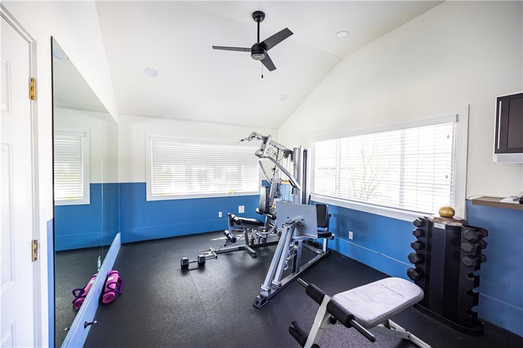 1468 Briarwood Road Northeast, Unit 1005 Atlanta, GA 30319 - Photo 38 of 45 a room with gym equipment and a window